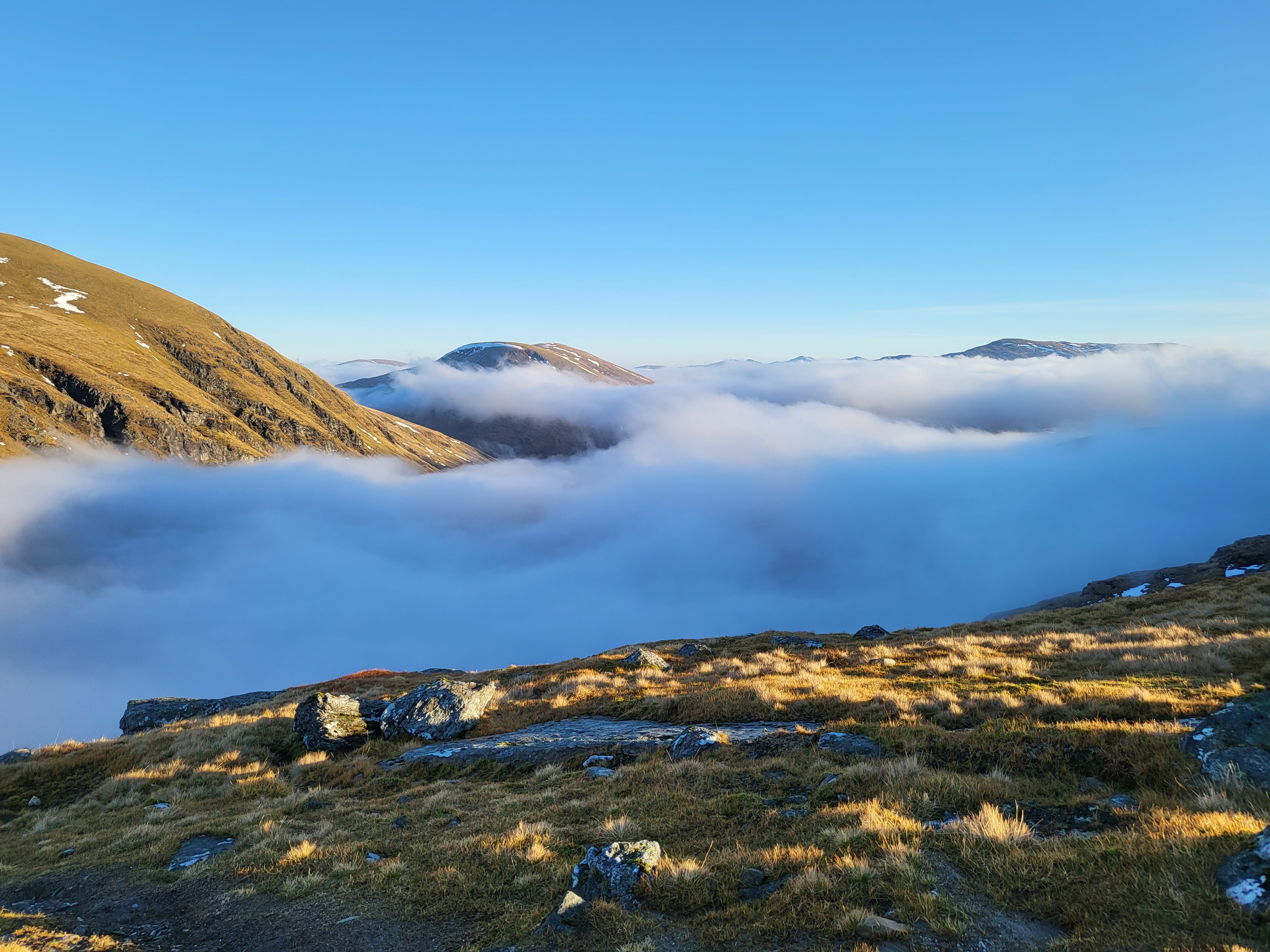 Mountains rising above the clouds