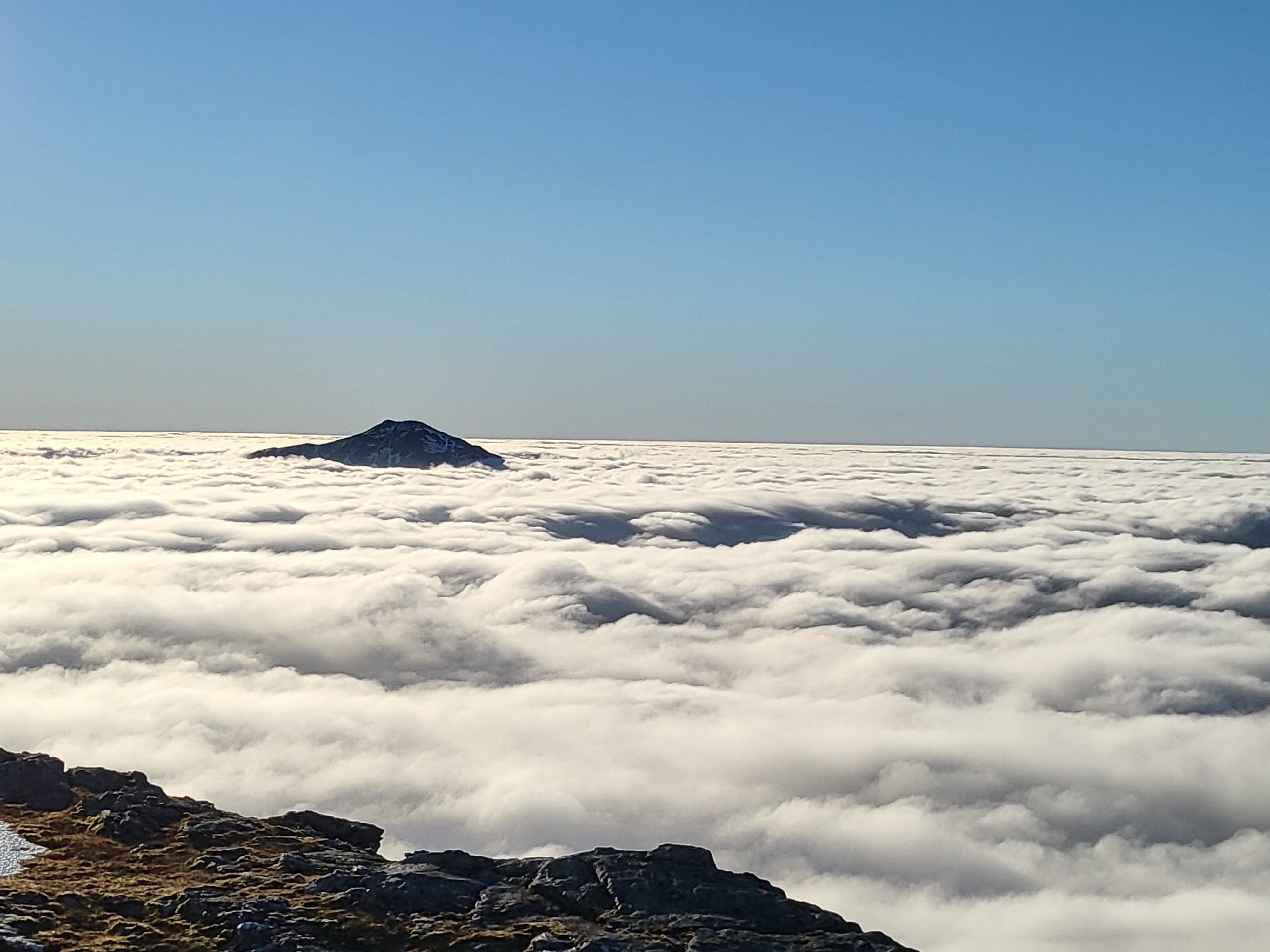 Mountain tops poking through a cloud Inversion