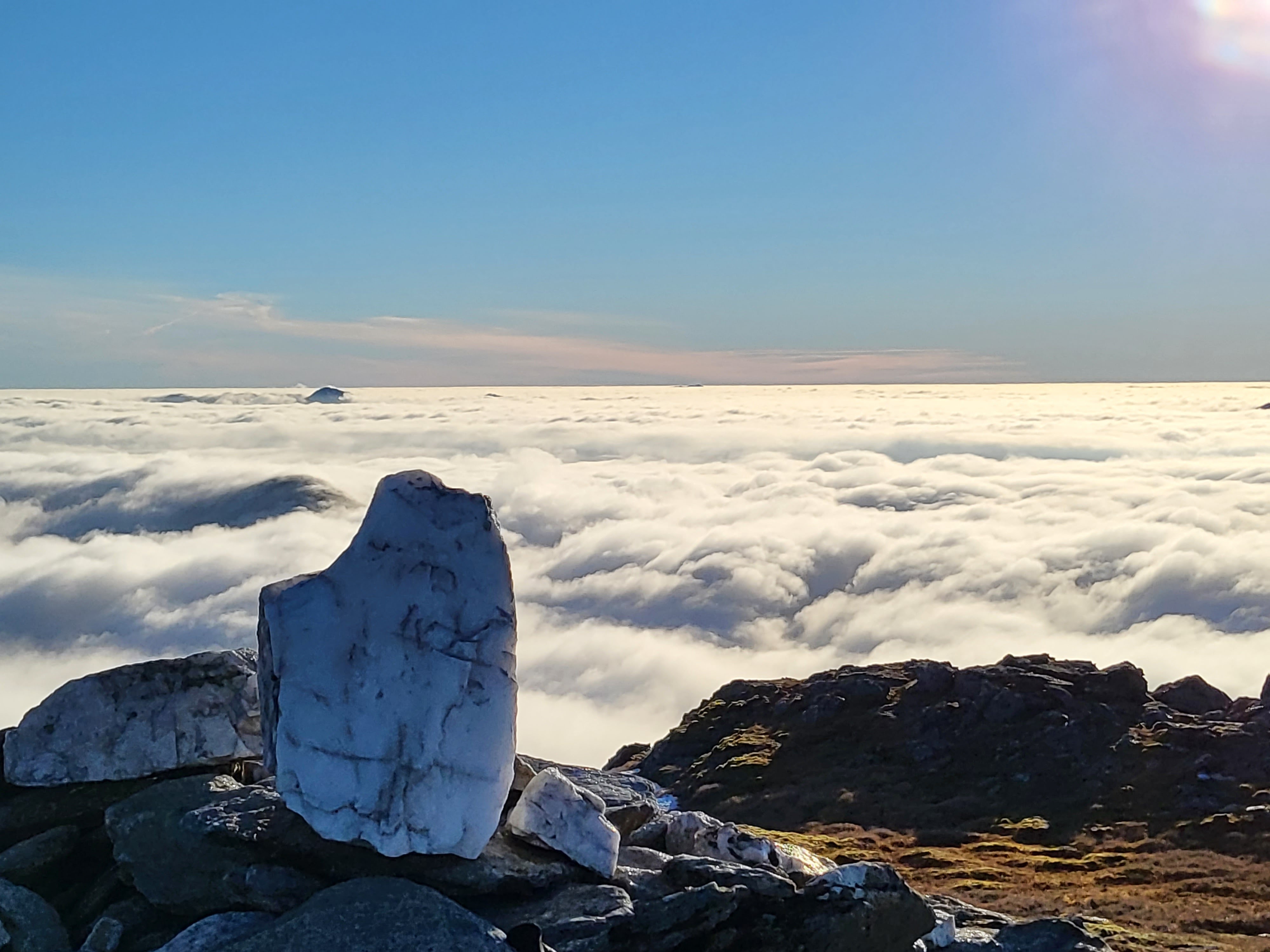 Mountain tops poking through a cloud Inversion from the summit of Beinn Dorian