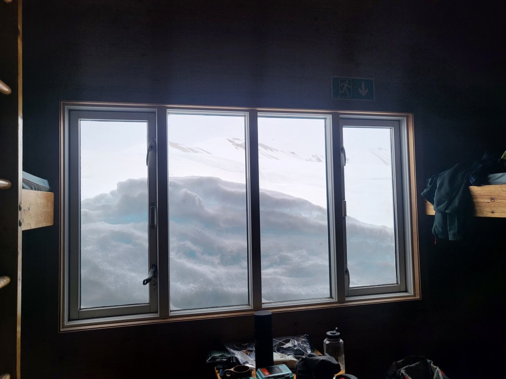 Deep snow outside the windows.