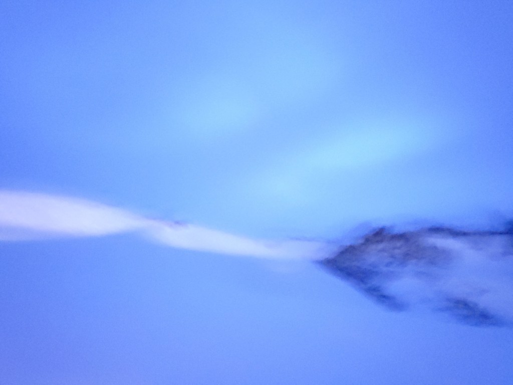 Night sky over mountains.