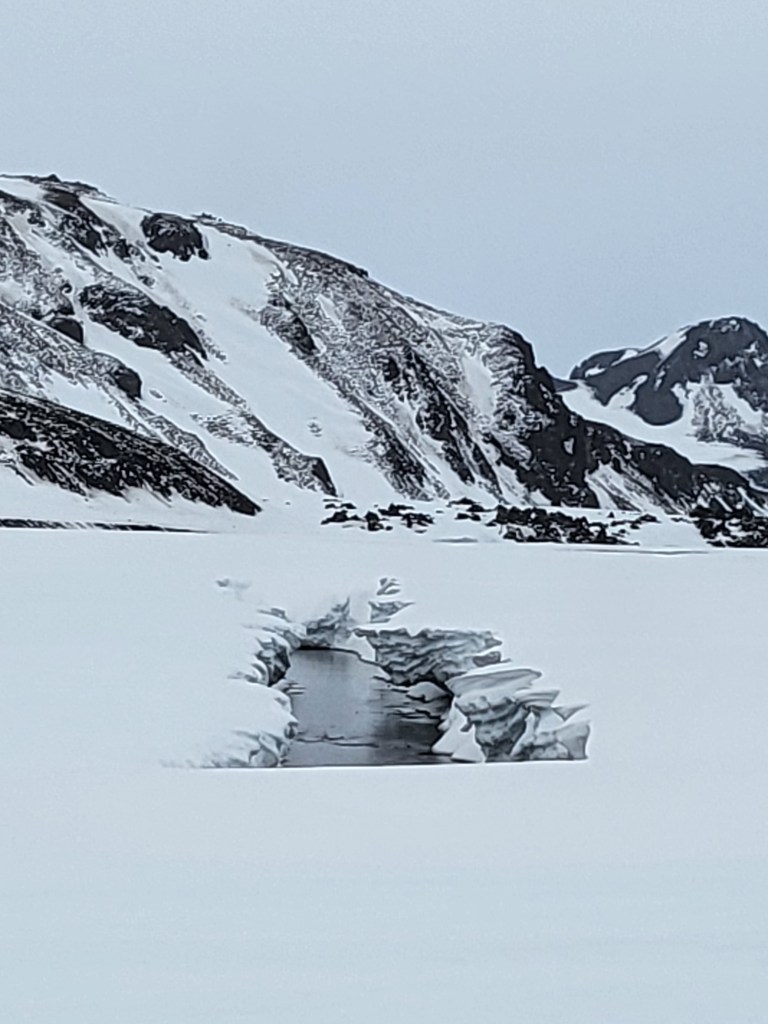 Mountain scene with winter river.