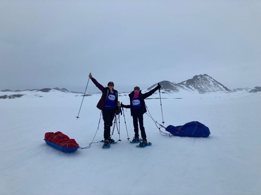 Trekkers holding up a banner for Mind Charity.