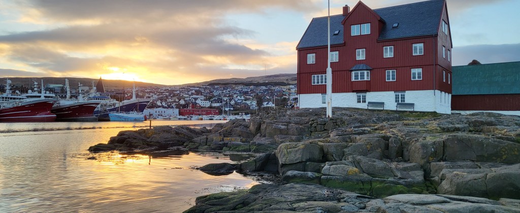 Torshavn, coastal town in sunset.